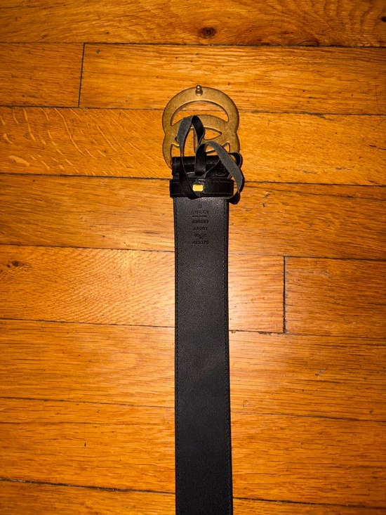 Authentic Gucci Leather double G belt in black and gold